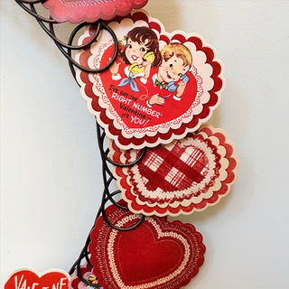 Close-up vintage Valentine heart card wreath detail