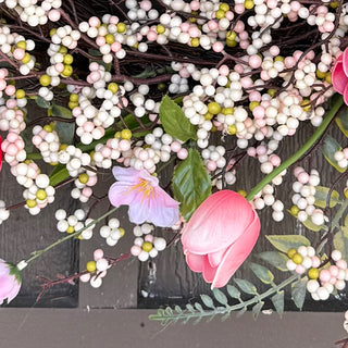Faux berry and pink blossom wreath detail