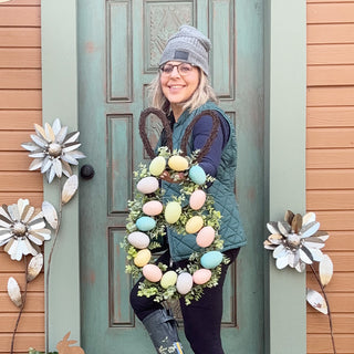 Lifestyle photo holding decorative Easter wreath