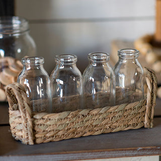 Wicker Basket with Four Milk Bottles